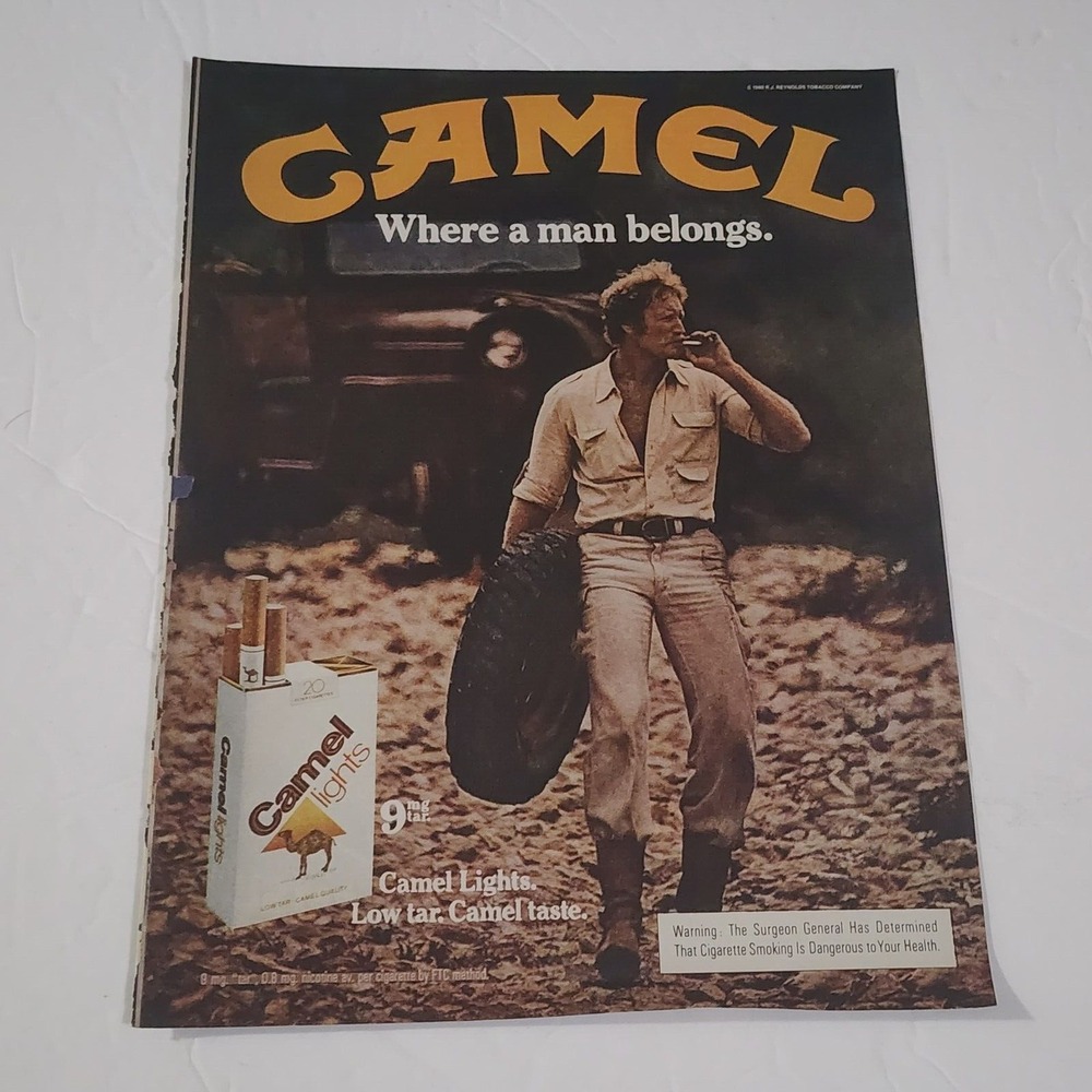 Vintage 1980s Camel Lights Print Ad Man Carrying Tire Smoking Cigarette Original